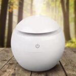 O Umidificador de Ar Ultrassônico com 7 Cores dos Chakras é um dispositivo inovador que combina os benefícios da cromoterapia, umidificação do ar e a energia dos chakras em um único aparelho. Projetado para criar um ambiente tranquilo e harmonioso, tanto visual quanto sensorialmente, este umidificador oferece uma experiência completa de bem-estar.
