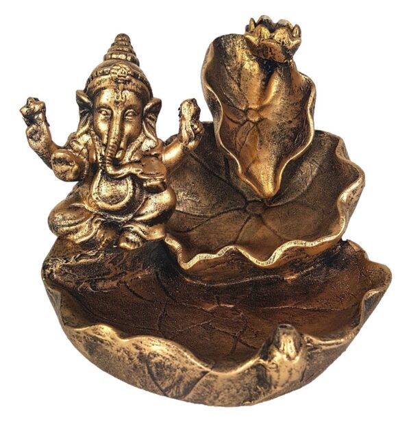 Este magnífico incensário cascata é confeccionado em resina com um acabamento em tom de bronze envelhecido, destacando a figura de Ganesha, o deus hindu da sabedoria, prosperidade e removedor de obstáculos. A peça apresenta Ganesha sentado ao lado de folhas de lótus detalhadamente esculpidas, formando um design harmonioso e sagrado. Quando o incenso é aceso, a fumaça desce em cascata, criando um efeito visual relaxante e mágico. Ideal para criar uma atmosfera serena e espiritual em qualquer ambiente, este incensário é perfeito para meditação, práticas religiosas ou simplesmente como um belo objeto decorativo. Especificações: – Porta Incenso folha Ganesha. – Material: Resina. Dimensões (A x L x P): – 11 x 12 x 13 cm.
